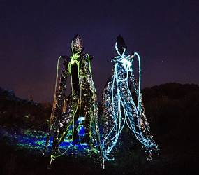 Space Alien LED stilts - book futuristic LEd colour changing stilt walkers